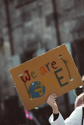 a person holding a sign