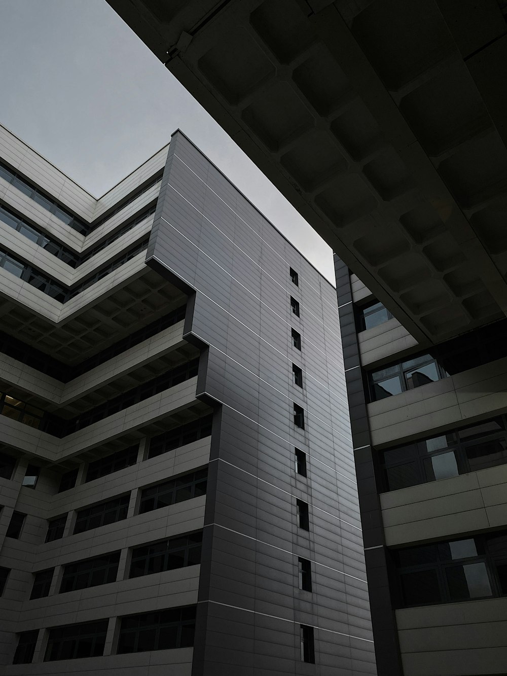 a tall building with a curved roof