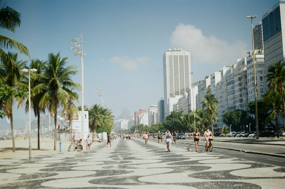 a group of people walking in a city