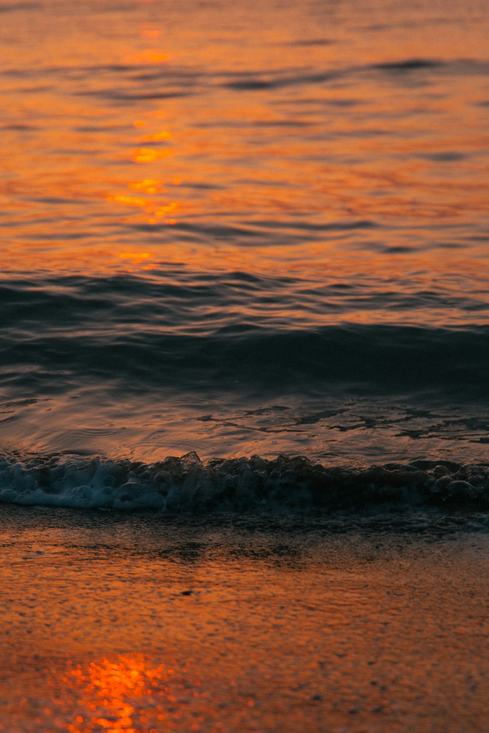 a sunset over a beach