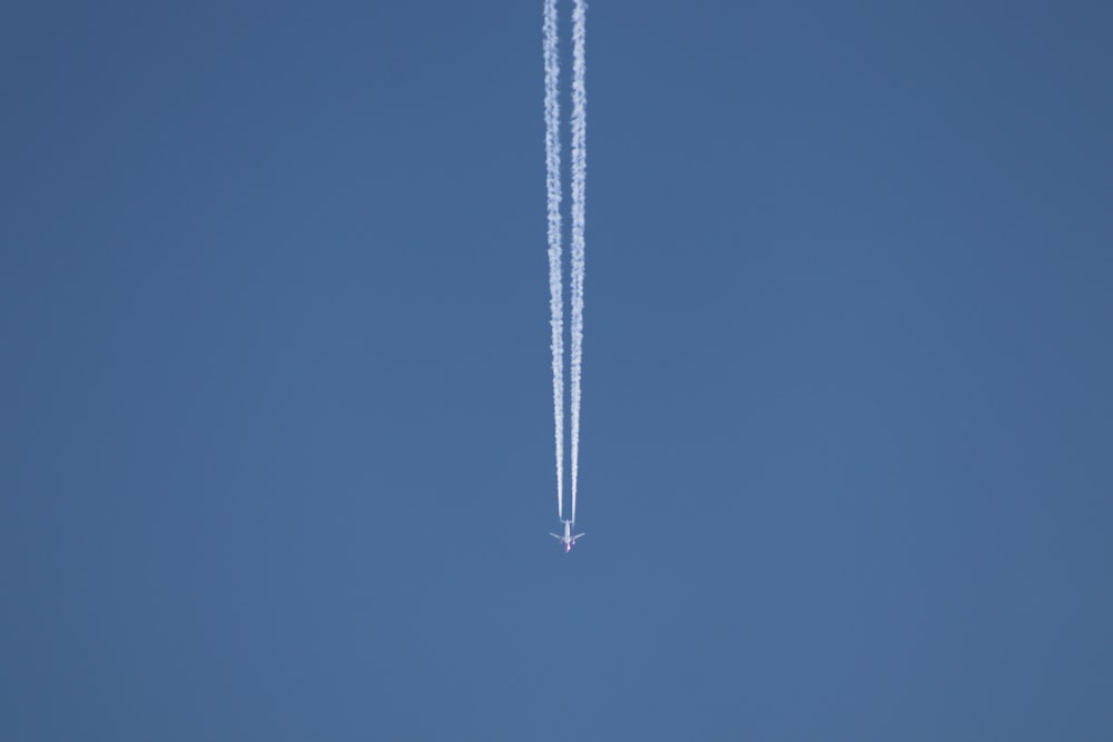 a jet leaving a trail of smoke