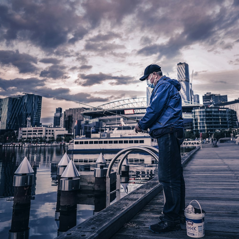 a person standing on a bridge