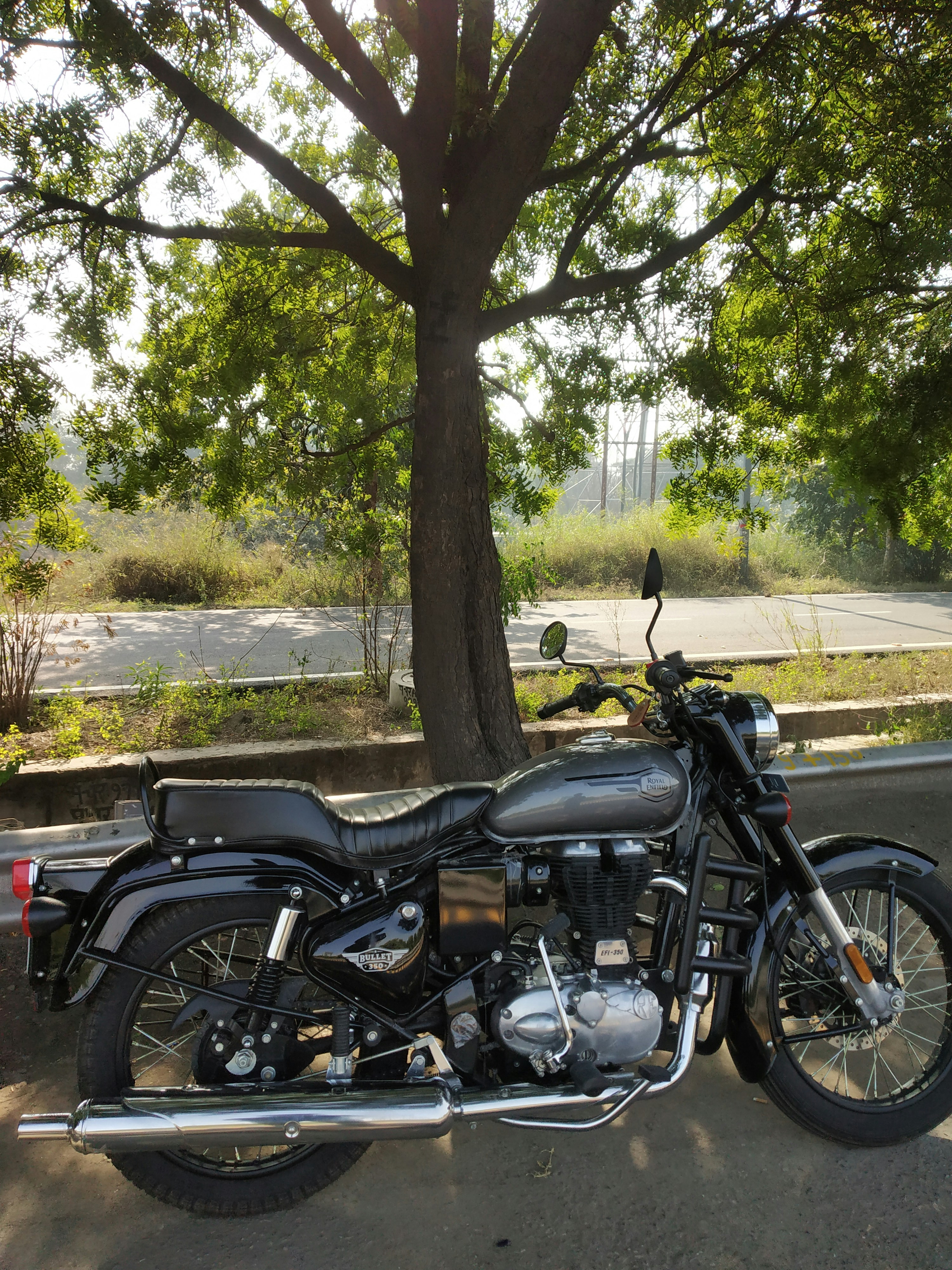 Royal Enfield Bullet motorcycle parked side view