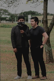 A behind-the-scenes moment of a collaboration between a fitness brand and a student creator outdoors.