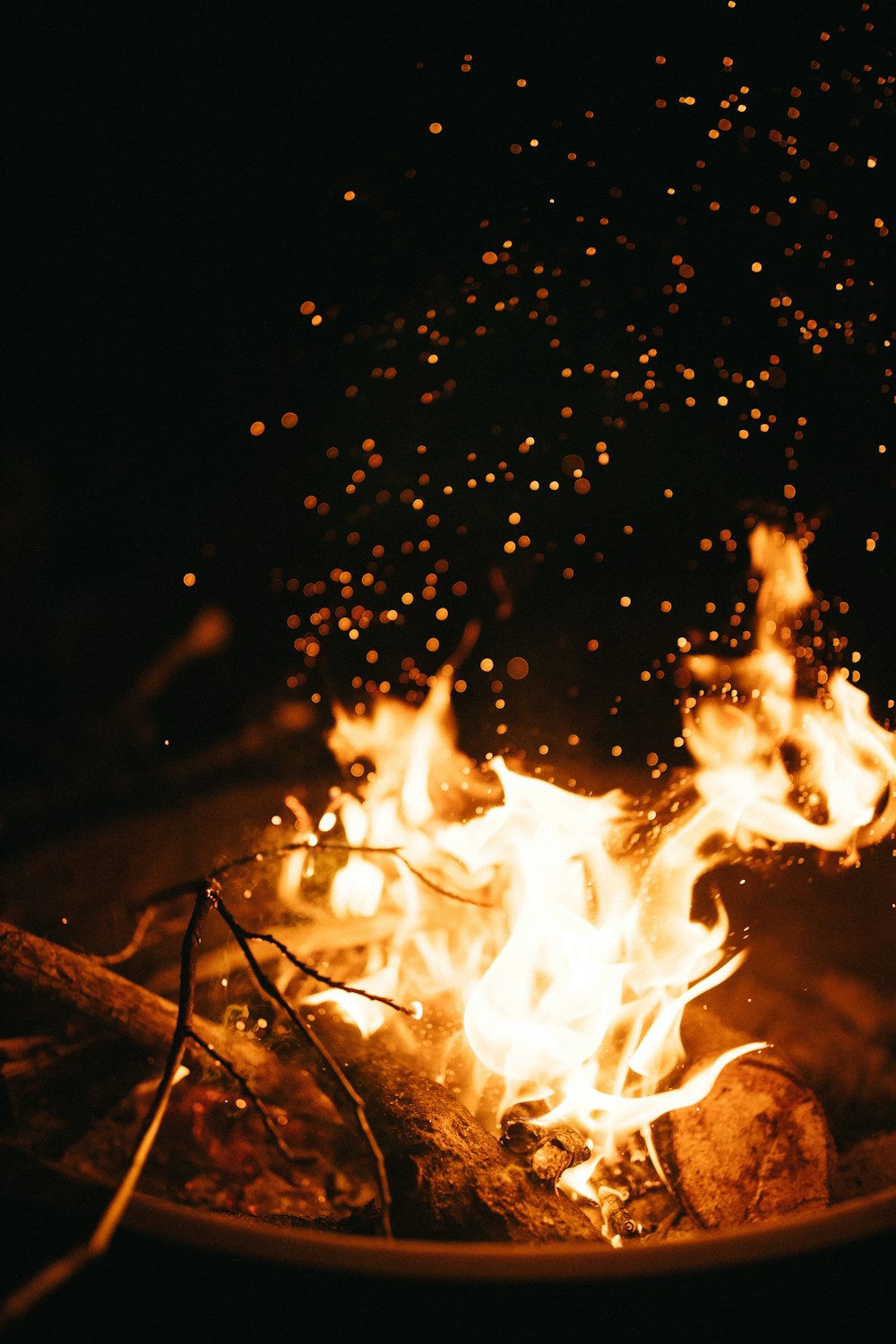 a fire burning in a pot