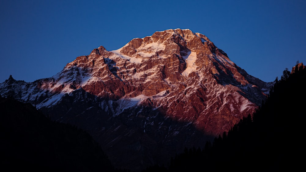 a mountain with snow