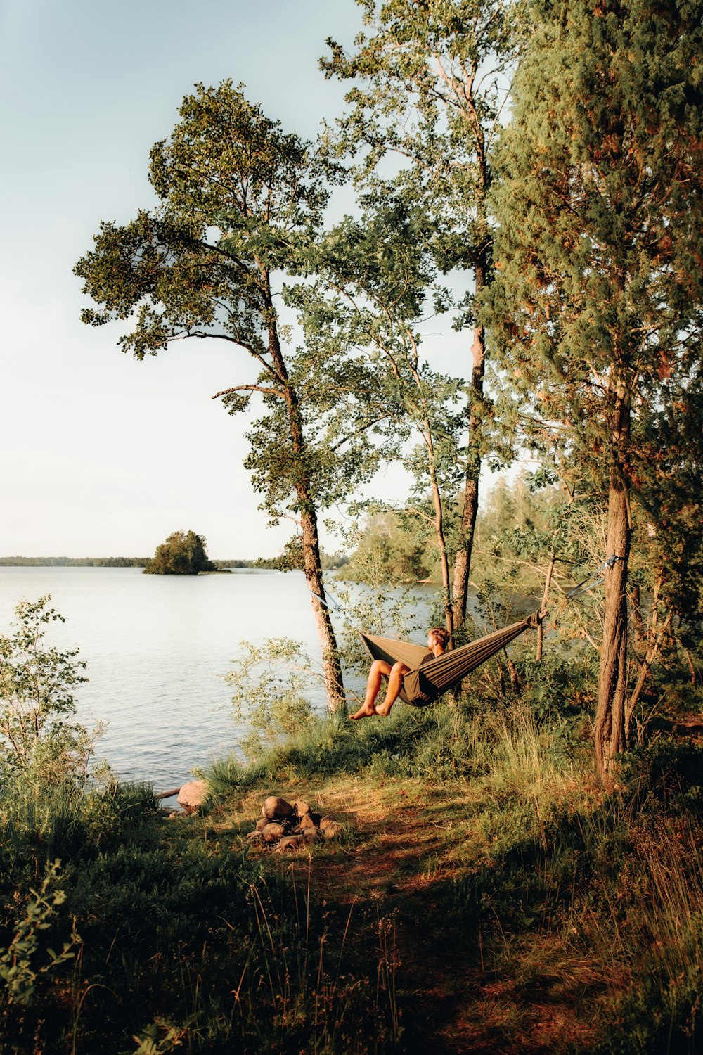 a bench next to a lake