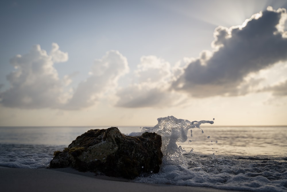 a large rock in the ocean