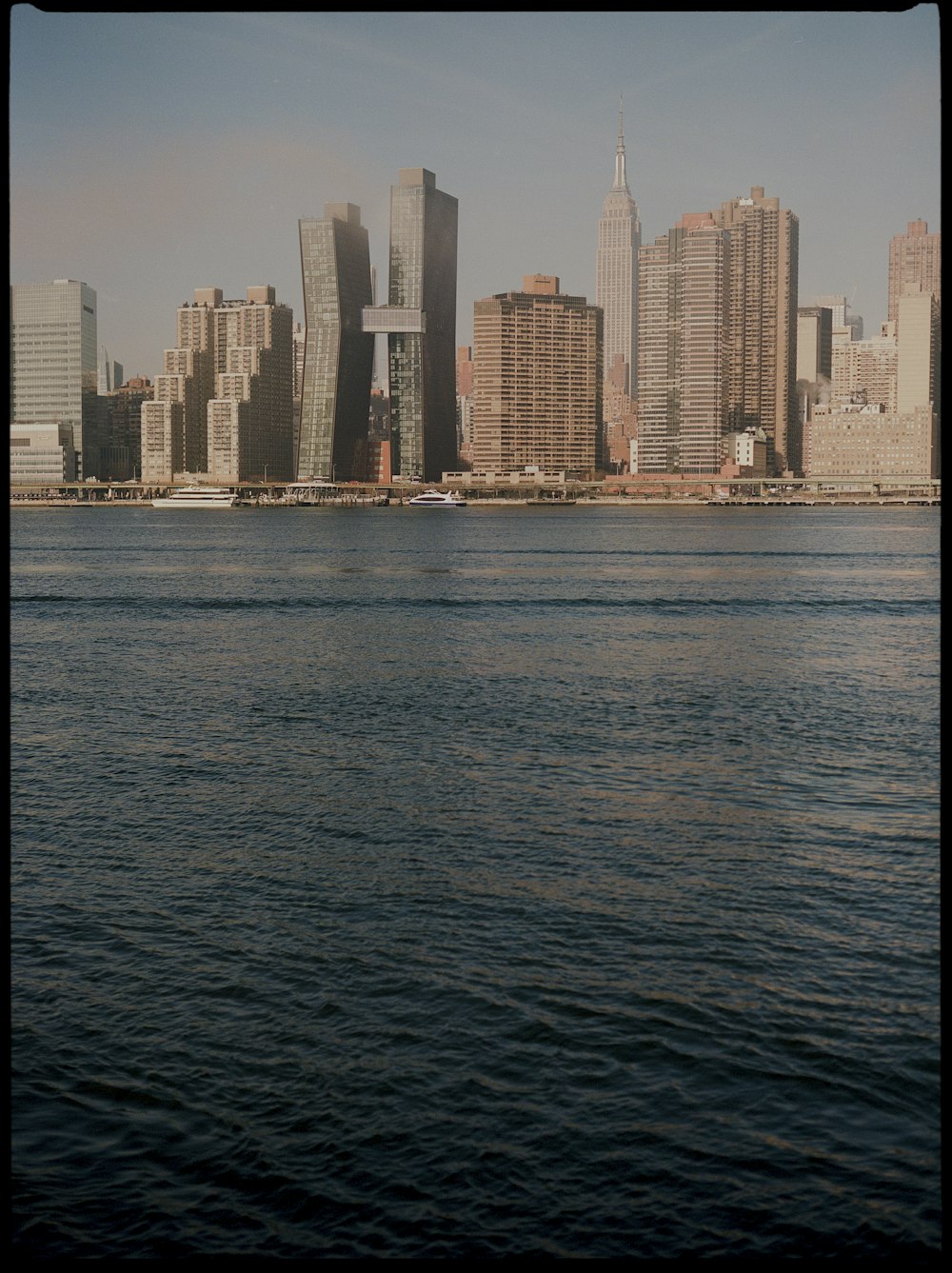 a city skyline across the water