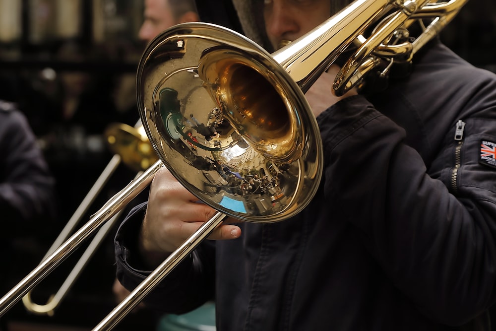 a person playing a trumpet