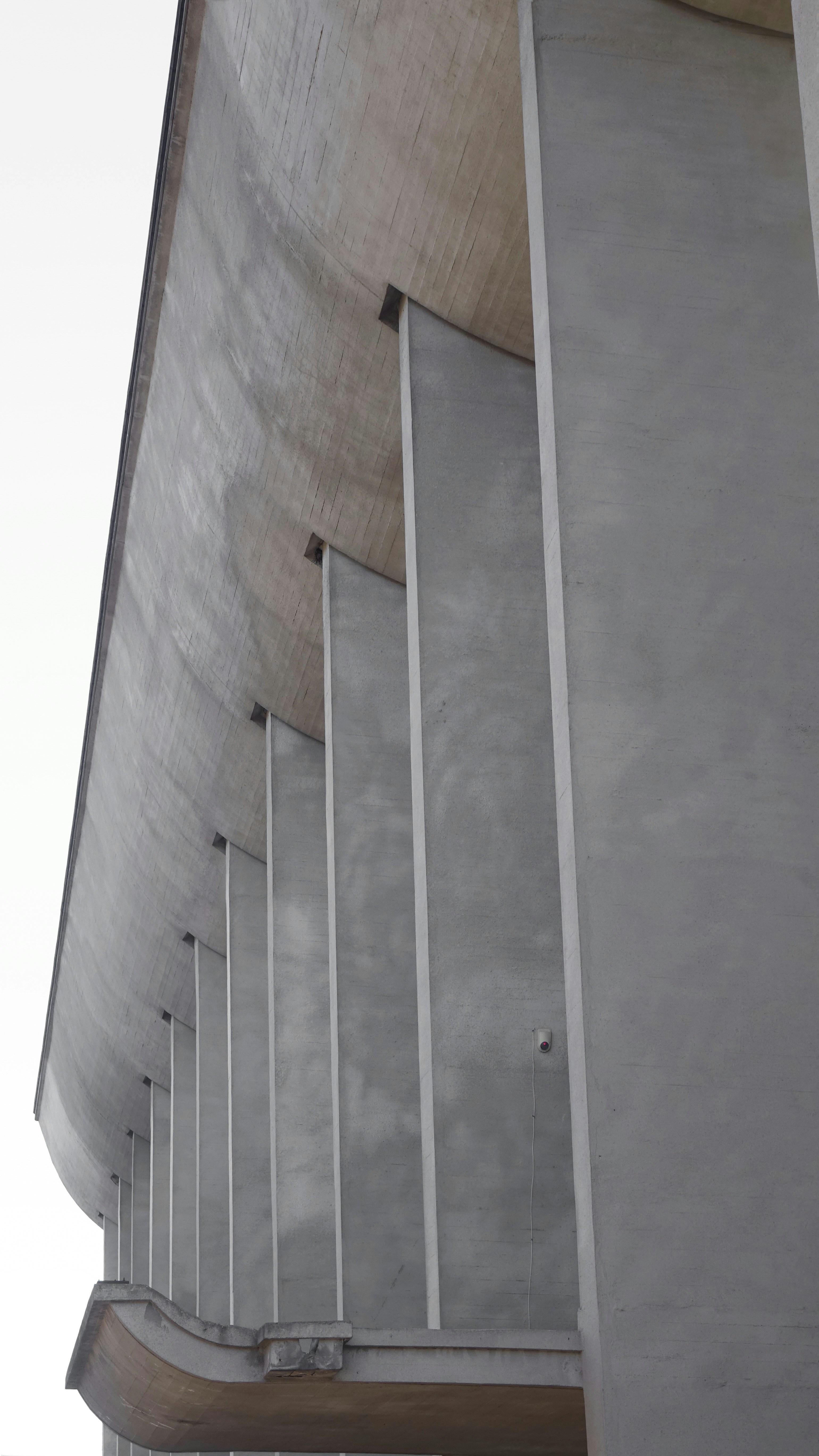 a concrete structure with a metal frame