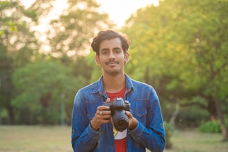 a man holding a camera