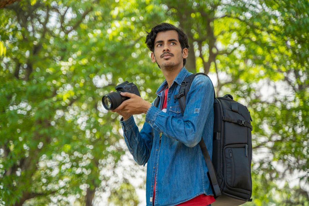 a man holding a camera