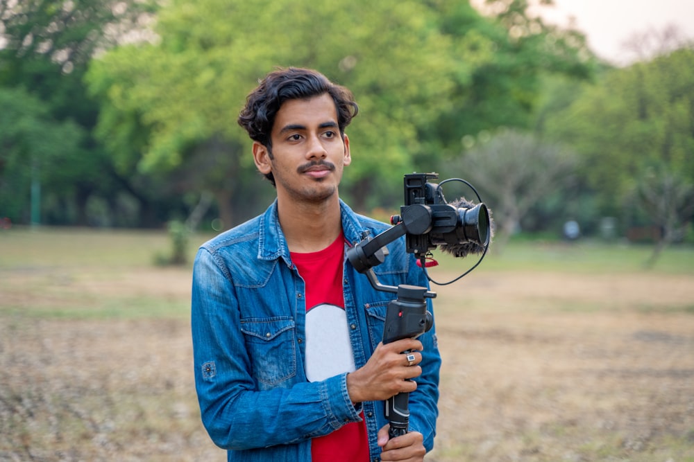 a person holding a camera