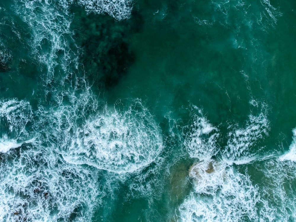 a wave crashing on a beach