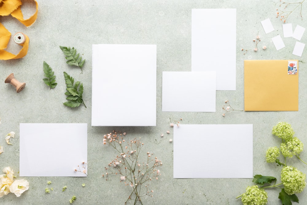 a group of paper on a table