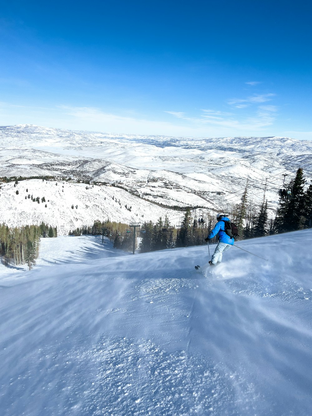 a person skiing on the snow