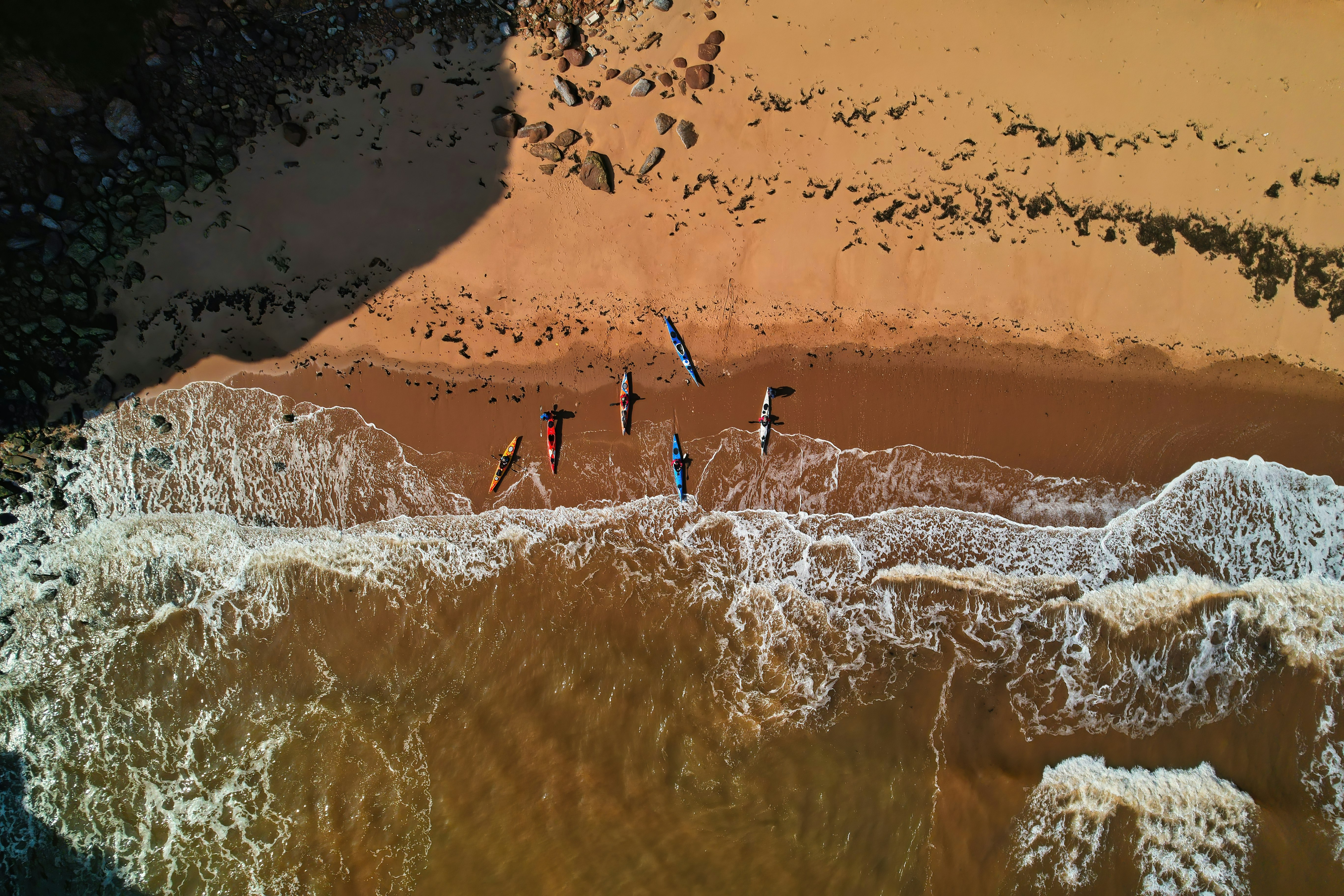 a group of people on a rock