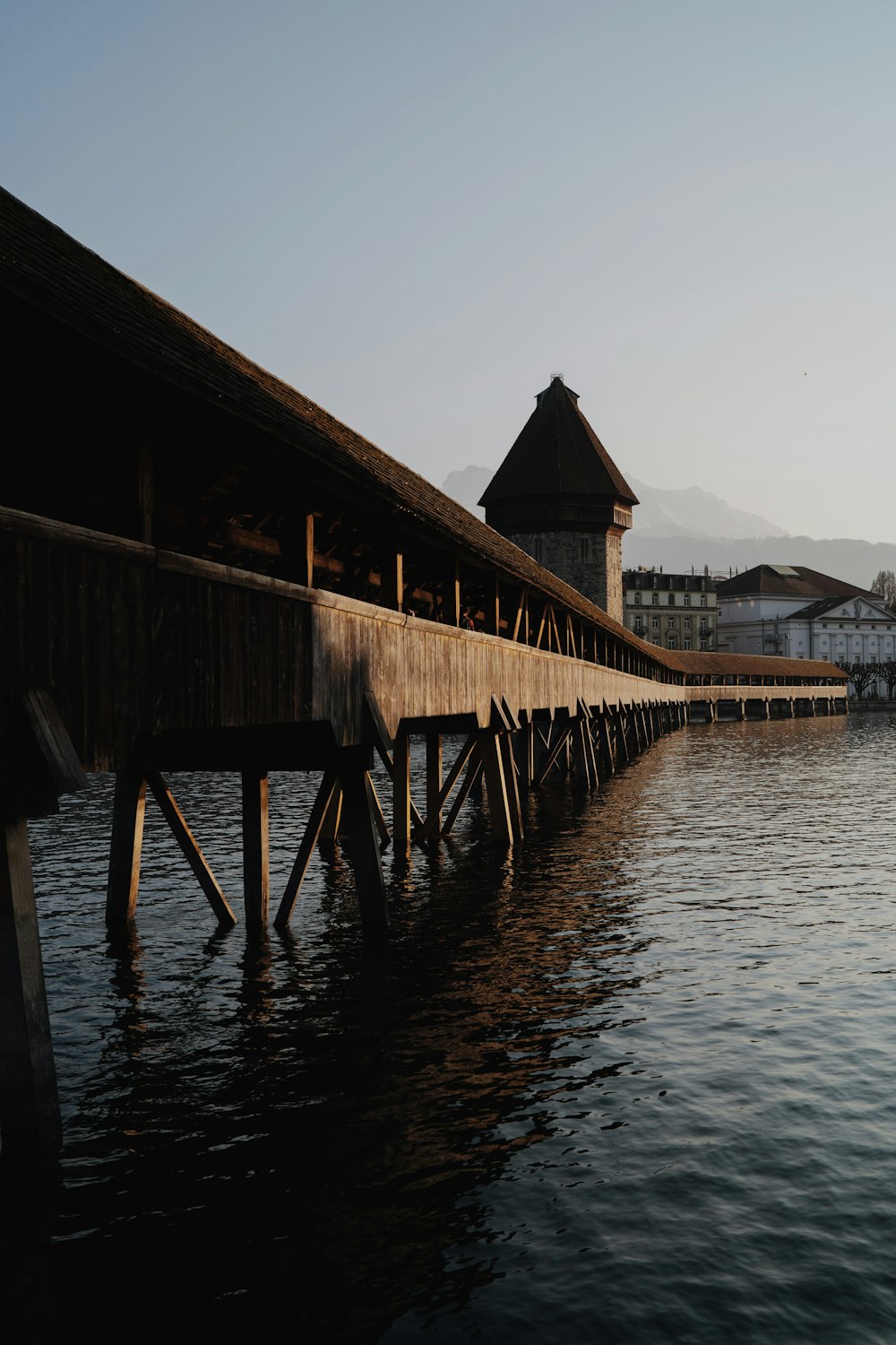 a wooden bridge over water