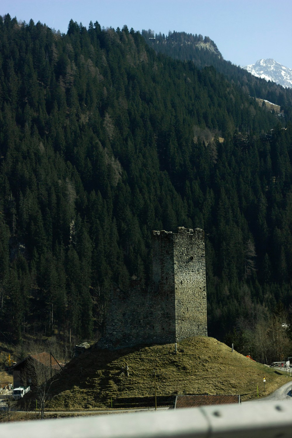 a stone tower on a hill