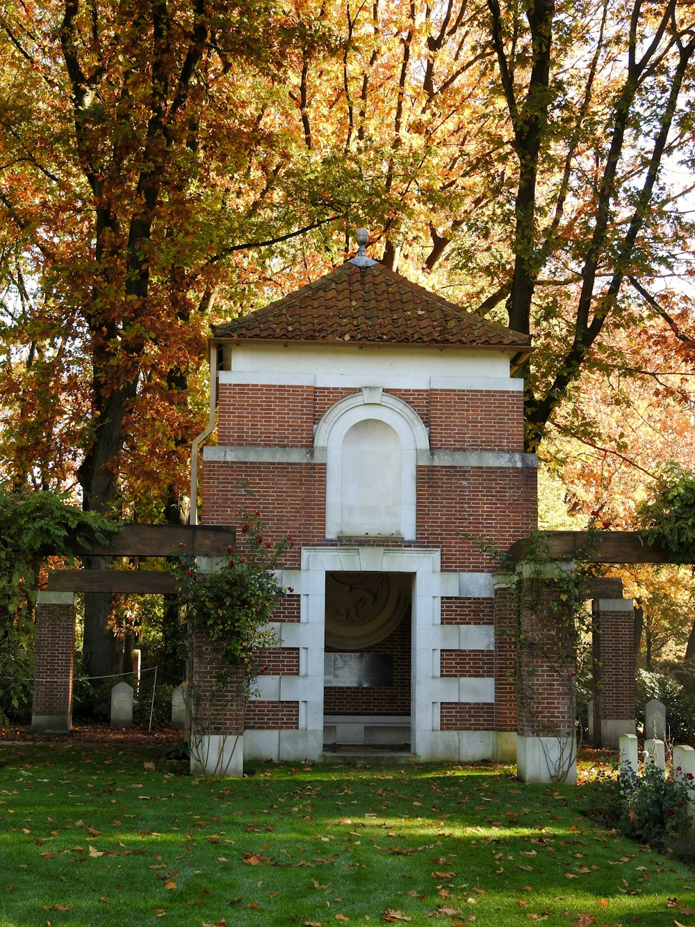 a brick building with a large arched doorway