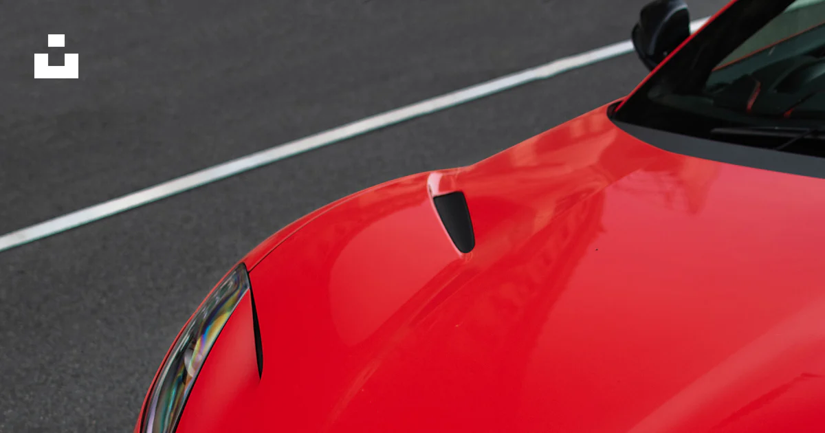 The front of a red car photo – Free Red Image on Unsplash