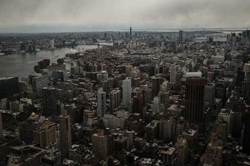 a large city landscape with Empire State Building in the background