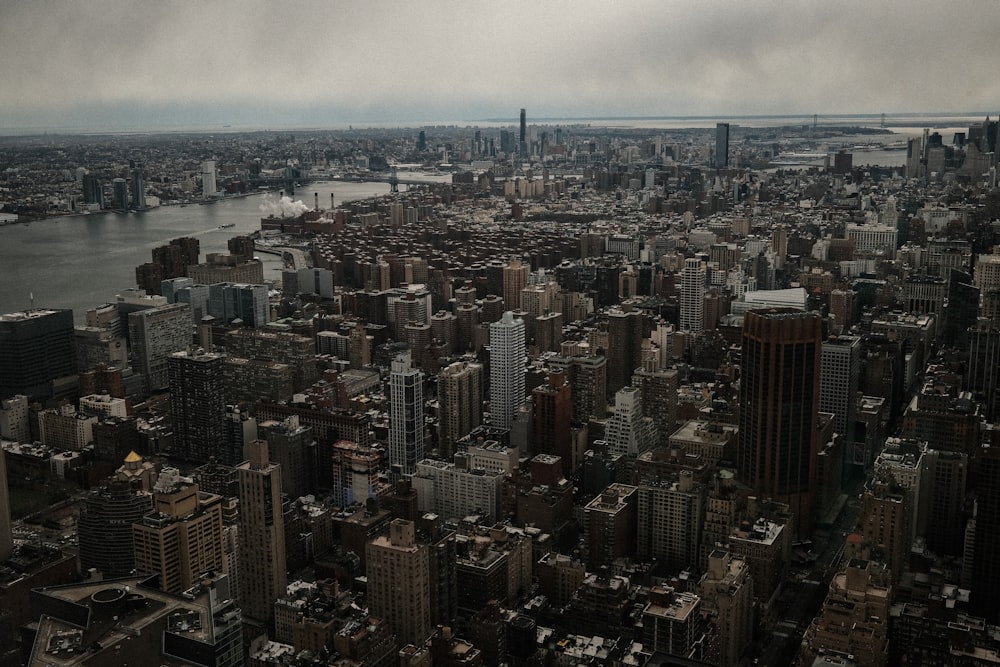 a large city landscape with Empire State Building in the background