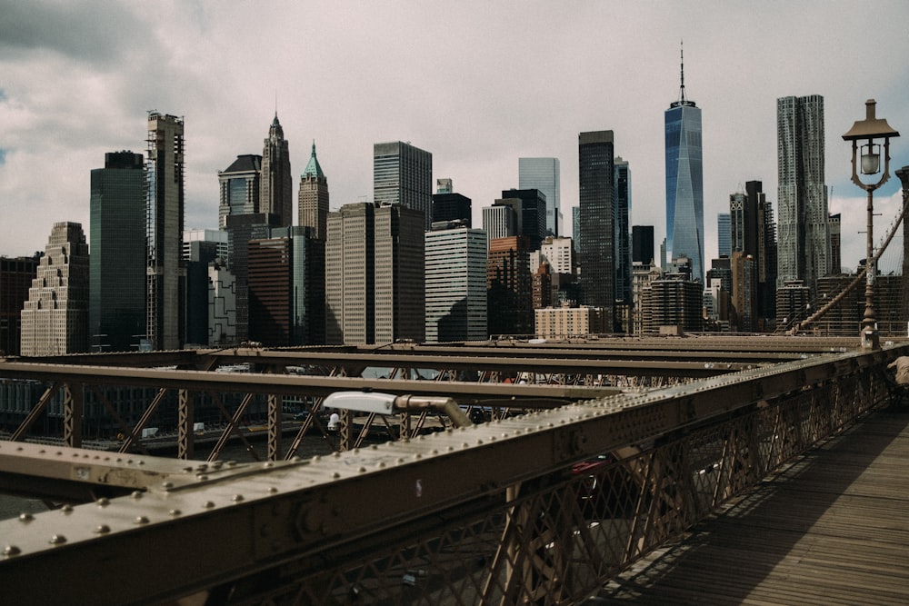 a city skyline with a bridge