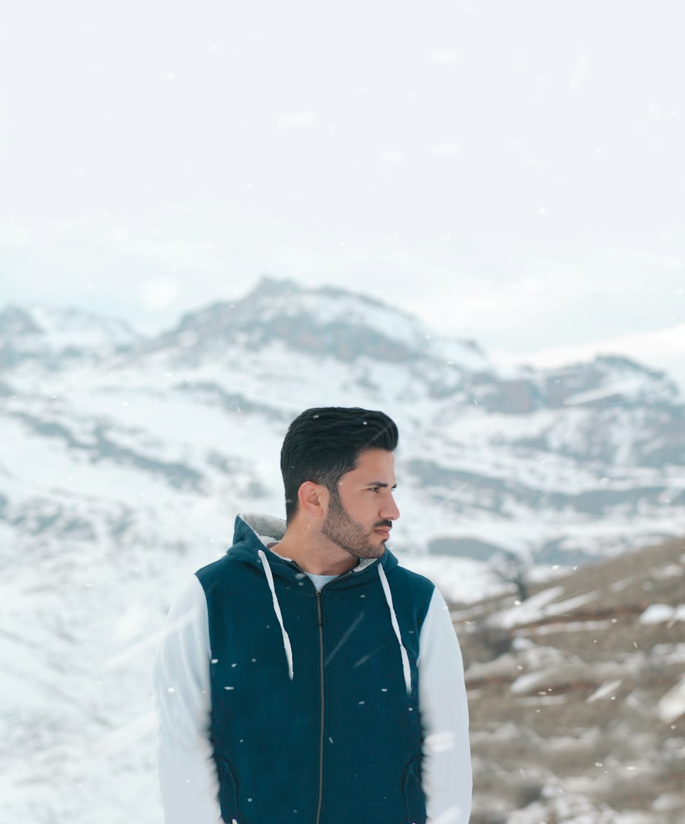 a man standing on a mountain