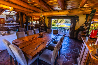 a large dining room with a large window