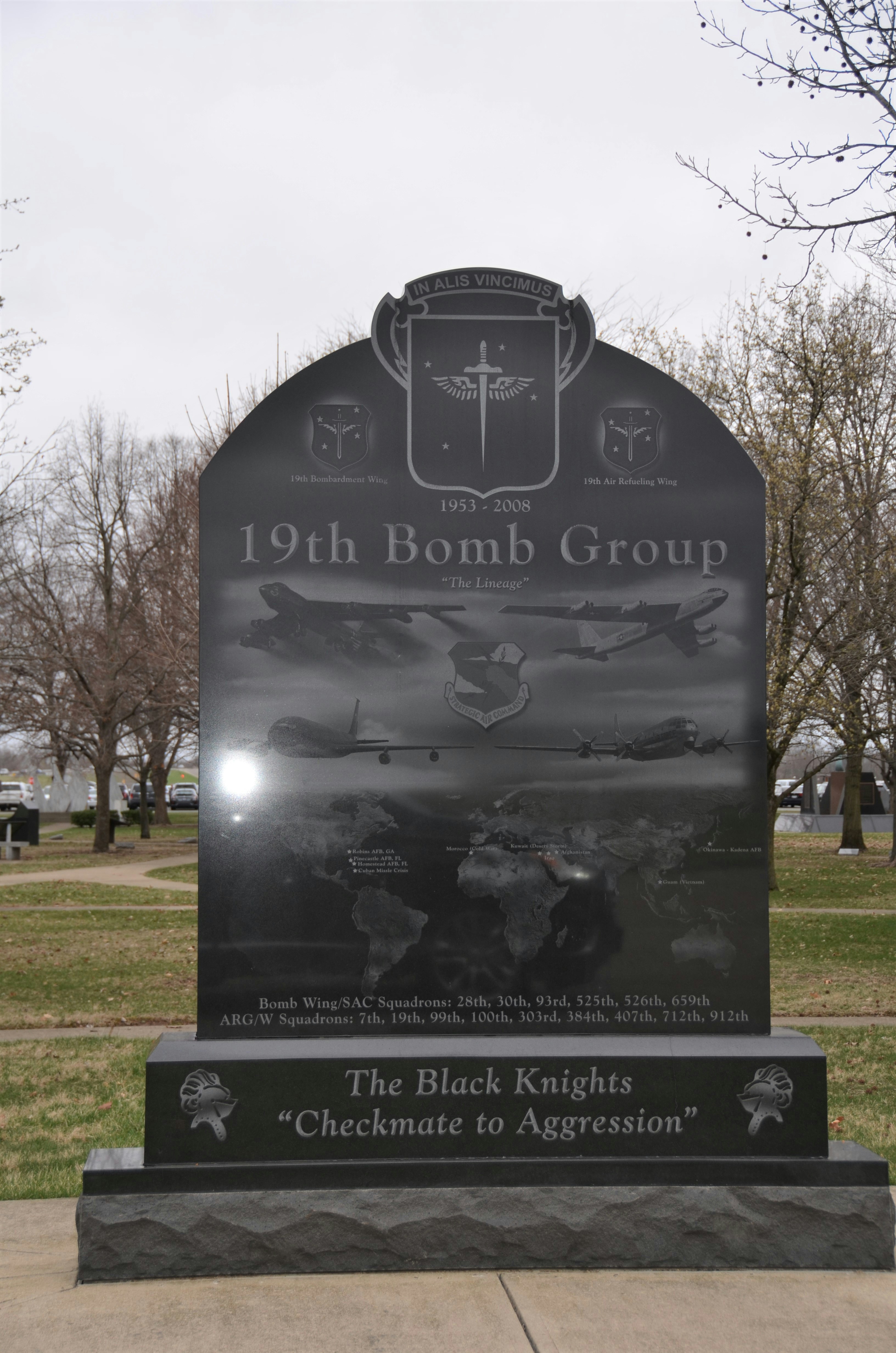 Custom upright granite memorial standing in a cemetery