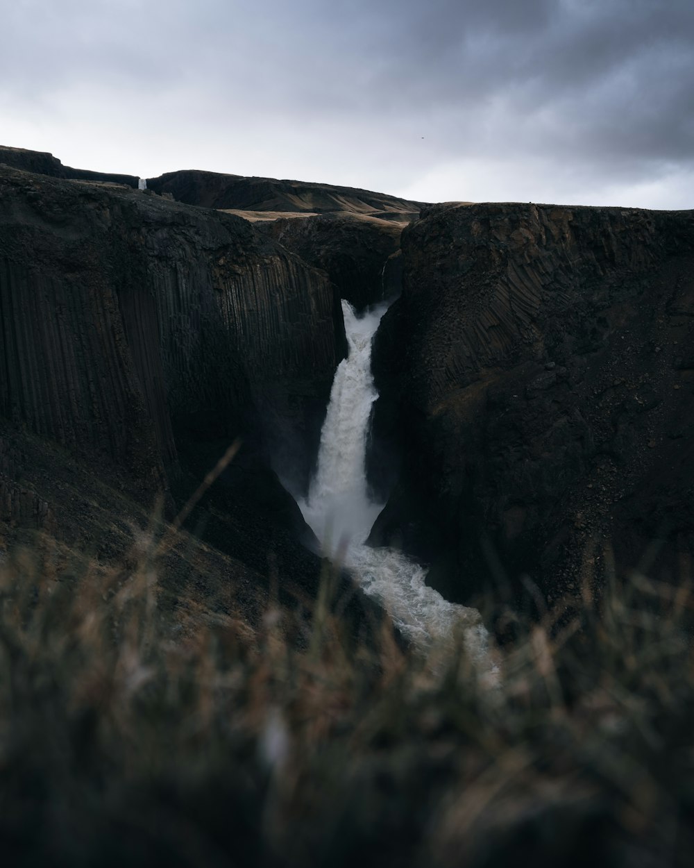 a waterfall in a rocky area