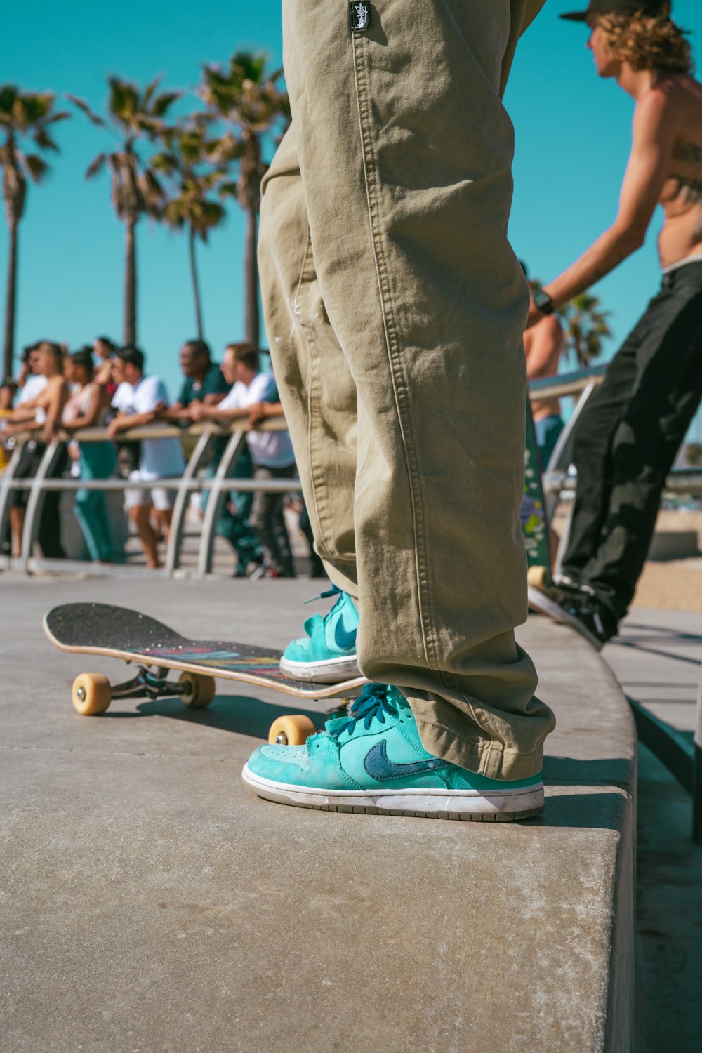 a person skating on the pavement