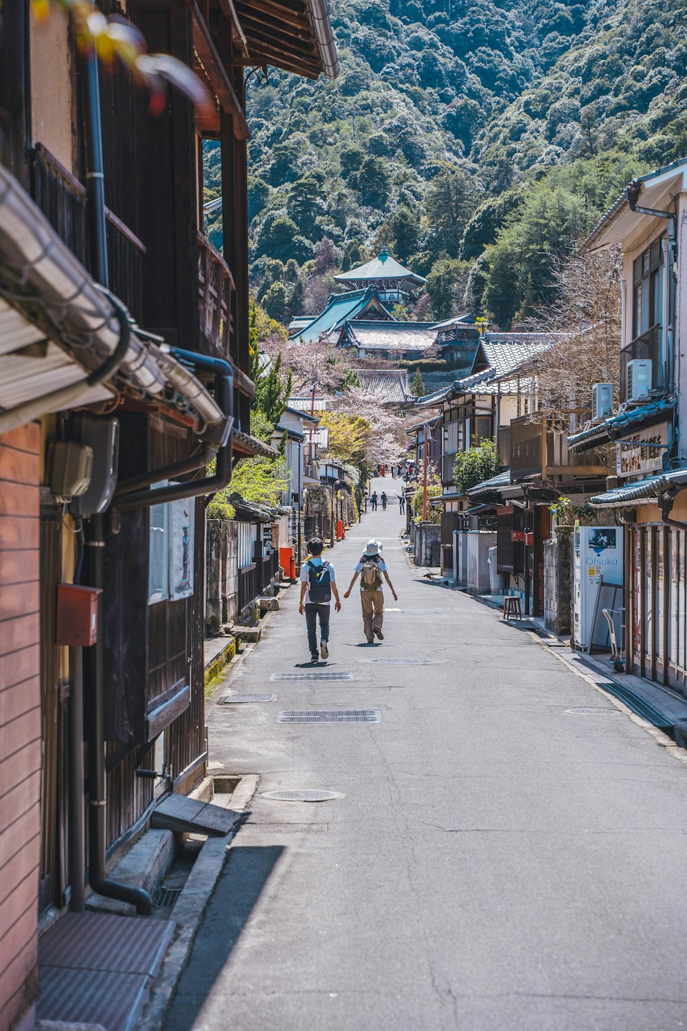 people walking down a street