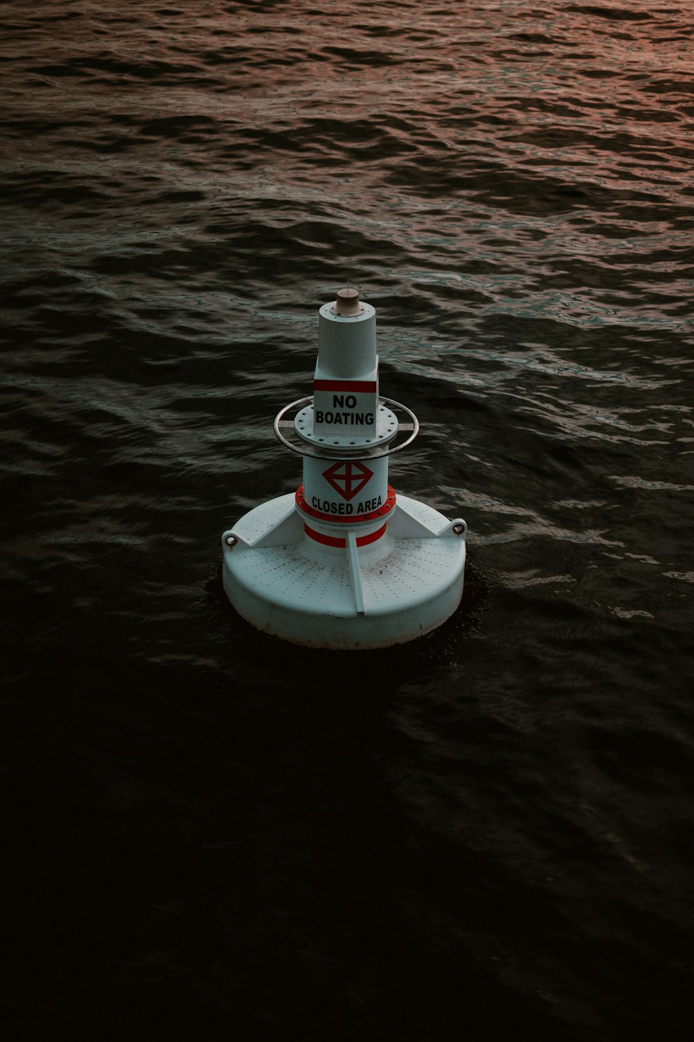 a small white and red boat
