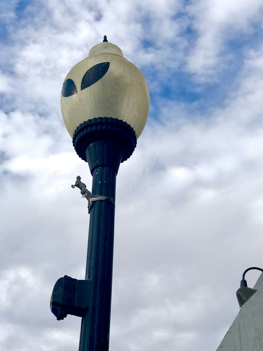 a light post with a round top