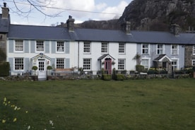a large house with a lawn in front of it