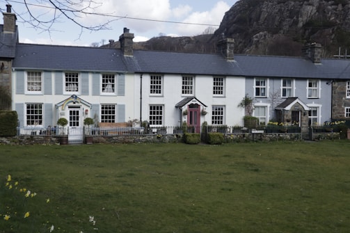 a large house with a lawn in front of it
