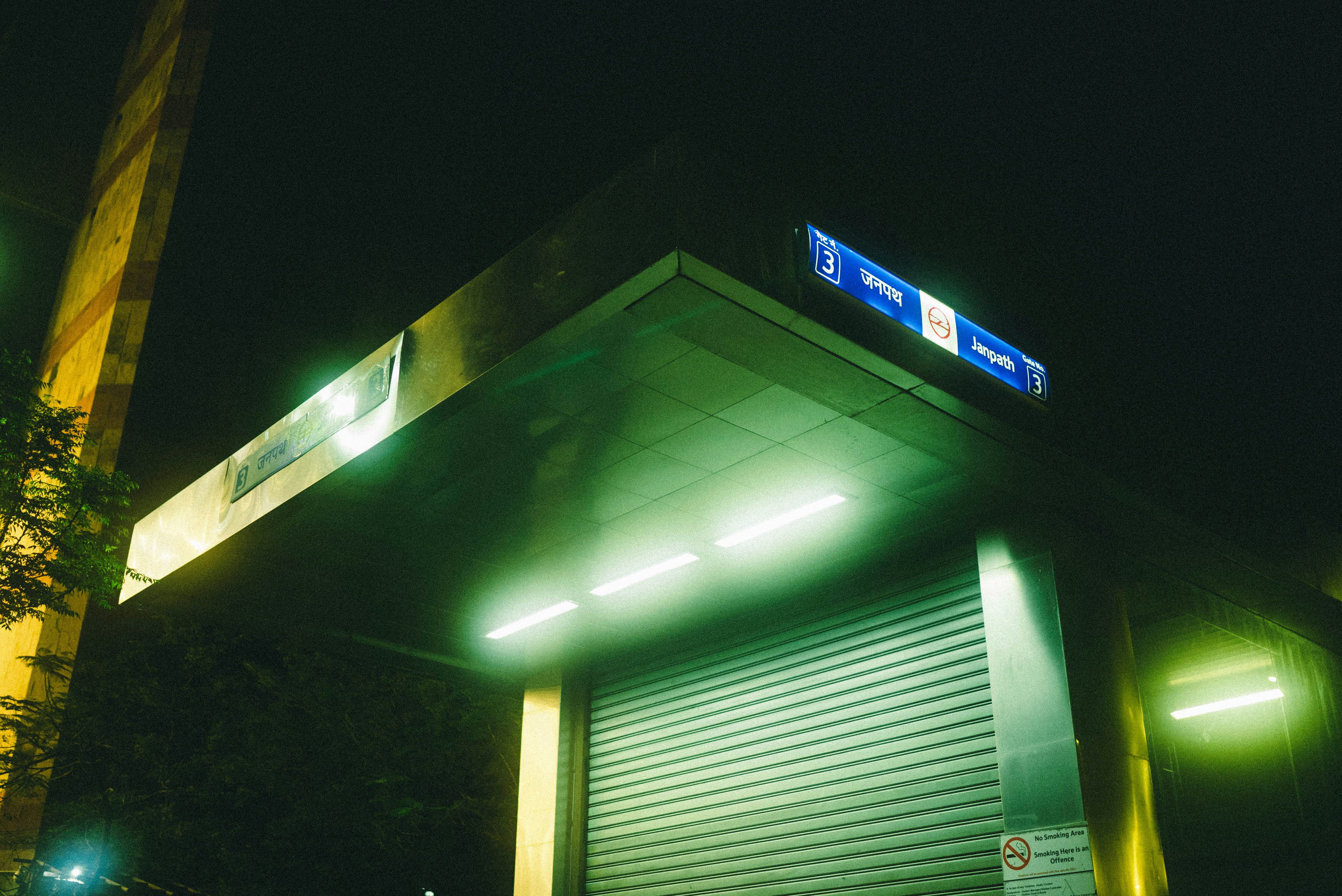 Home EV charger mounted in a modern garage, plugged into an electric vehicle