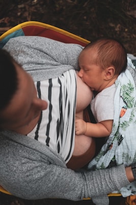 a person holding a baby