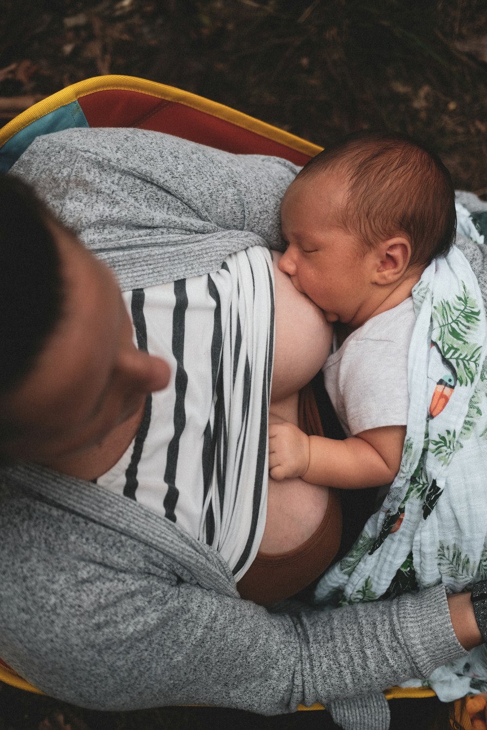 a person holding a baby