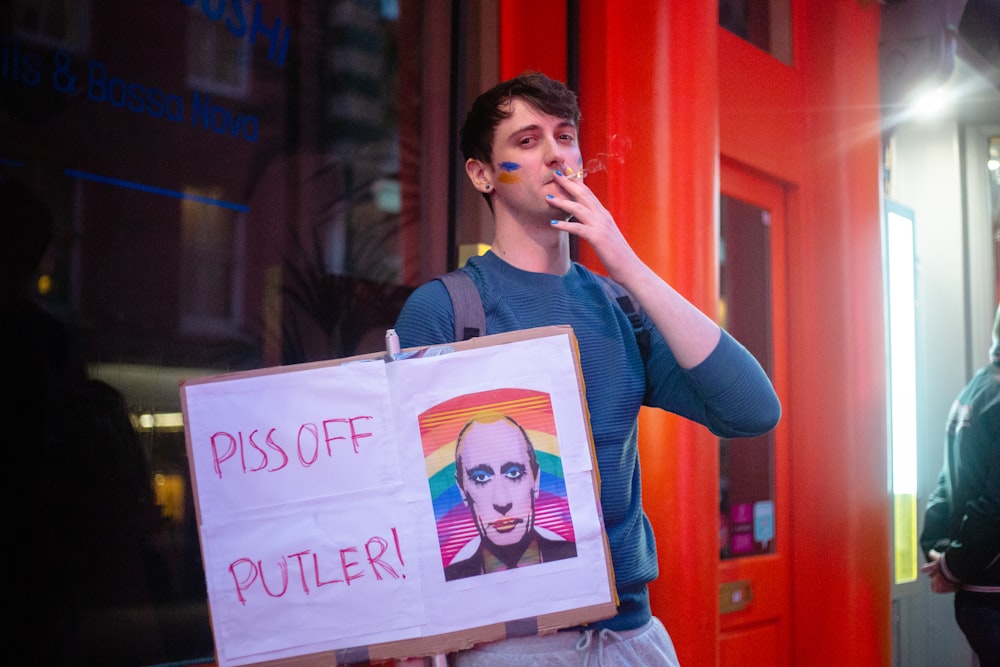 a person holding a sign