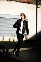 A model in motion wearing Lumina Apparel joggers, captured mid-stride on a city sidewalk.