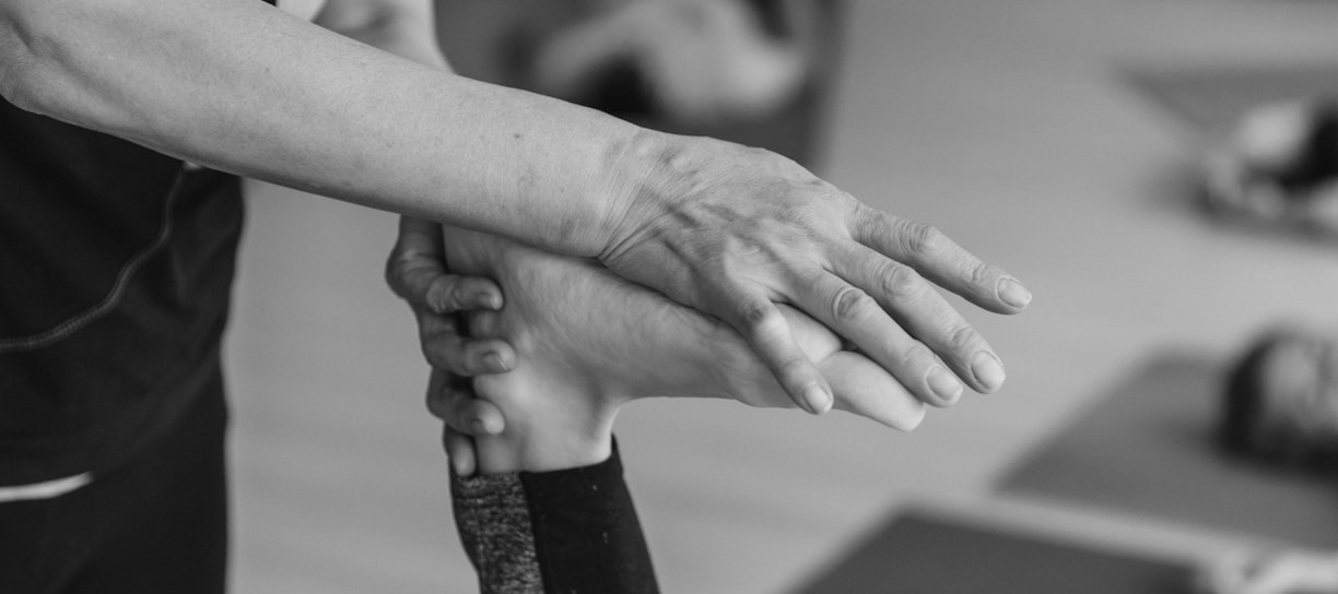 a close-up of a person's hands shaking