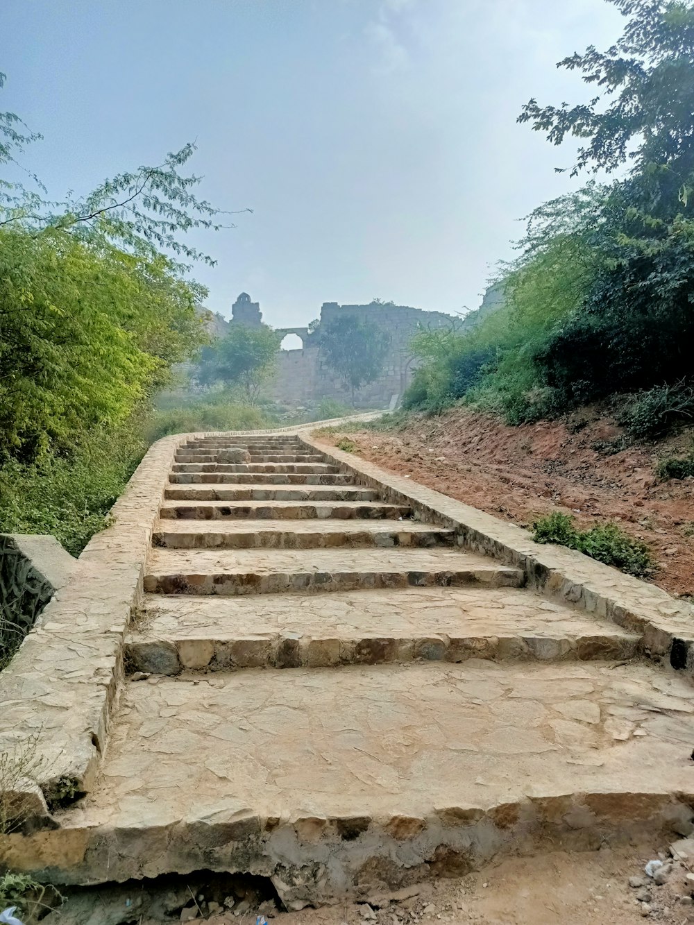 a stone staircase on a hill