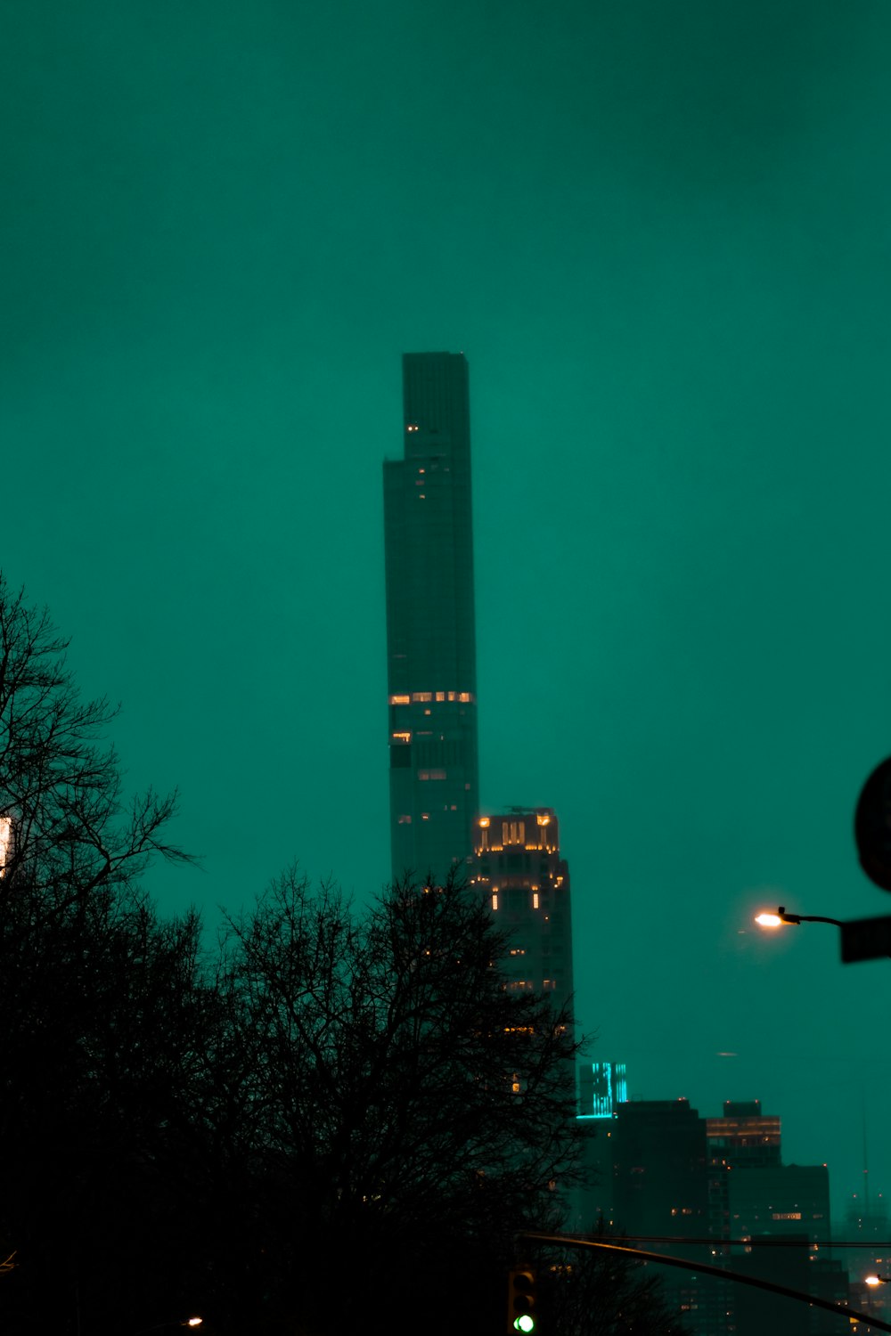 a tall building with lights at night