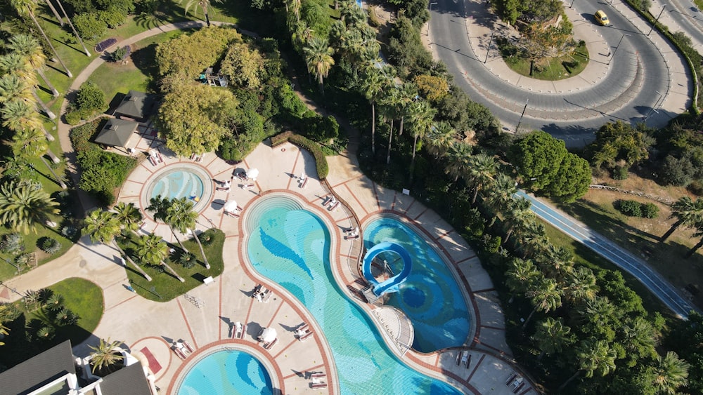 a large circular pool surrounded by trees