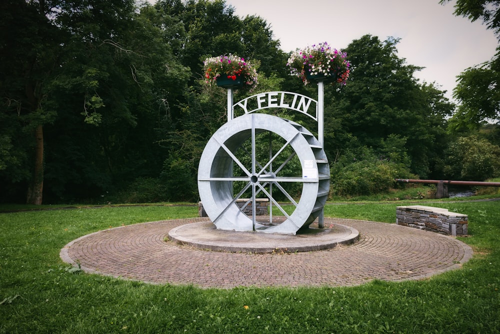 a stone sculpture in a park