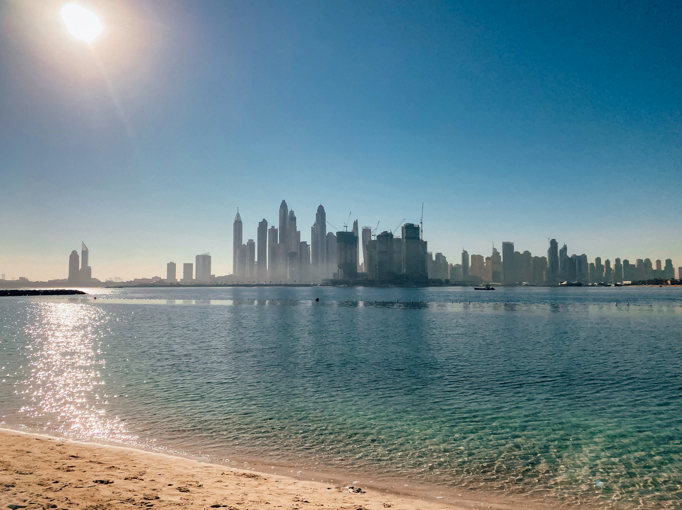 Sunny waterfront view of Palm Jumeirah in Dubai